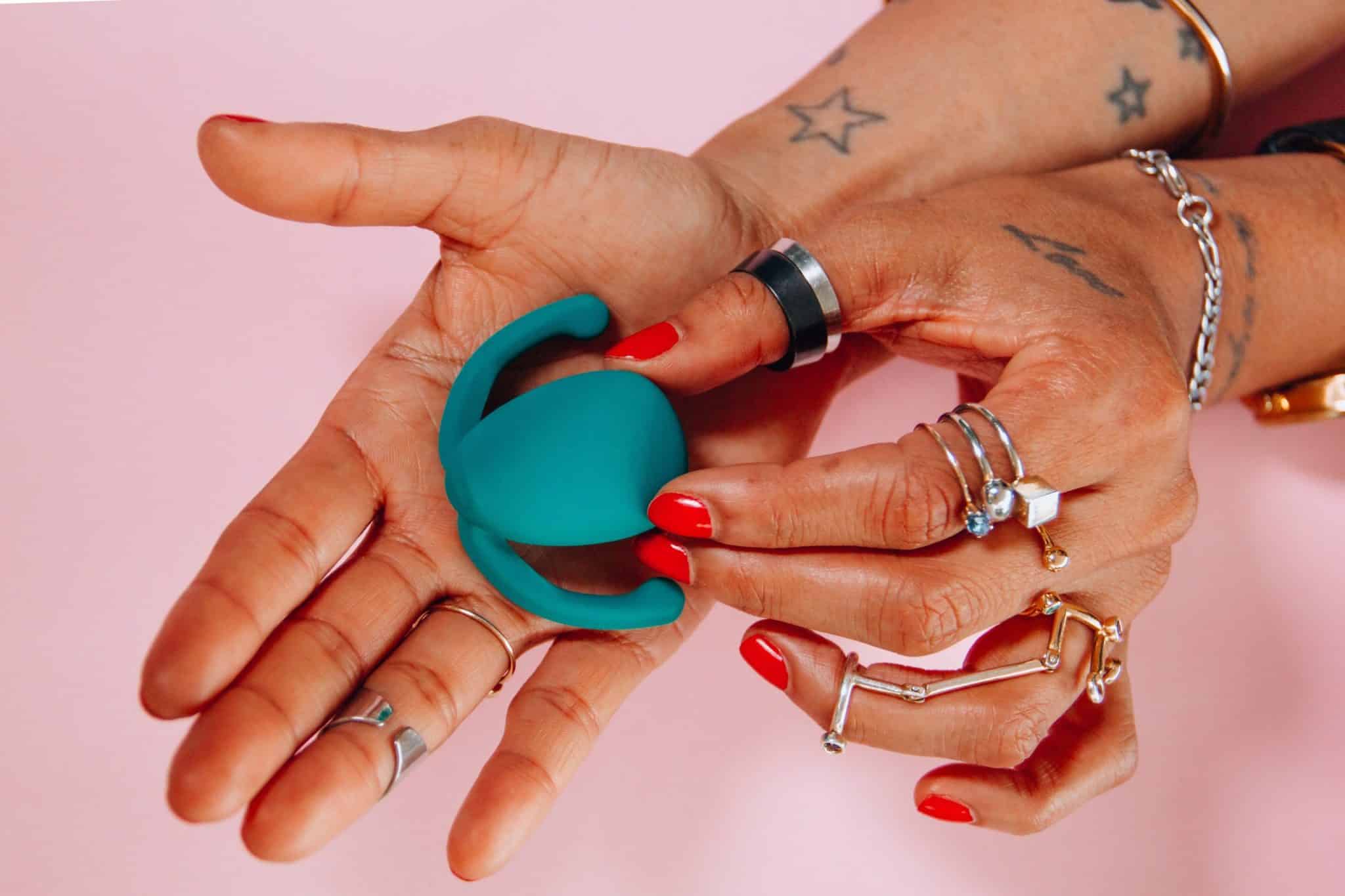 vibrator, woman holding sex toy
