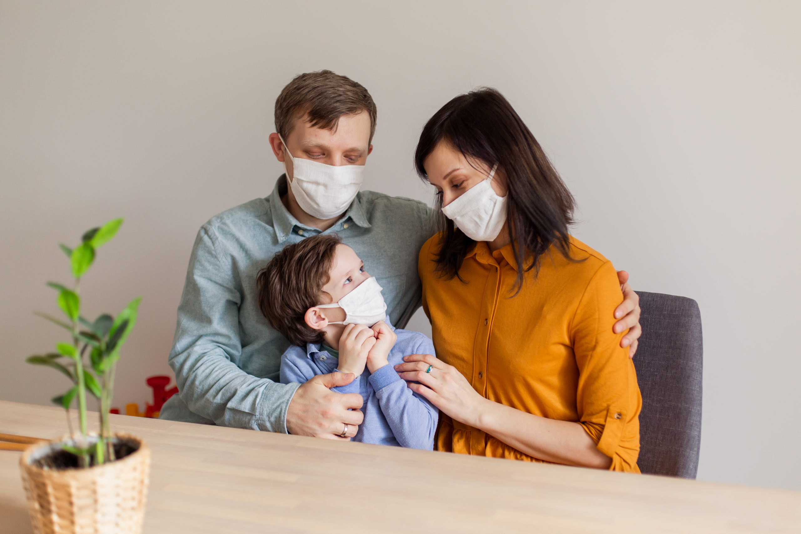 family with face masks